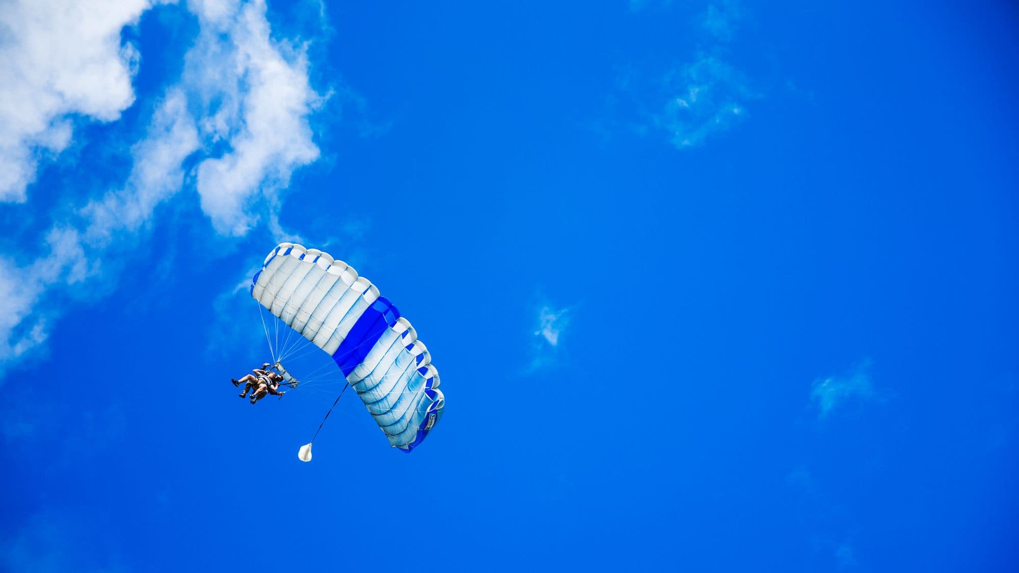 People hang-gliding in the sky